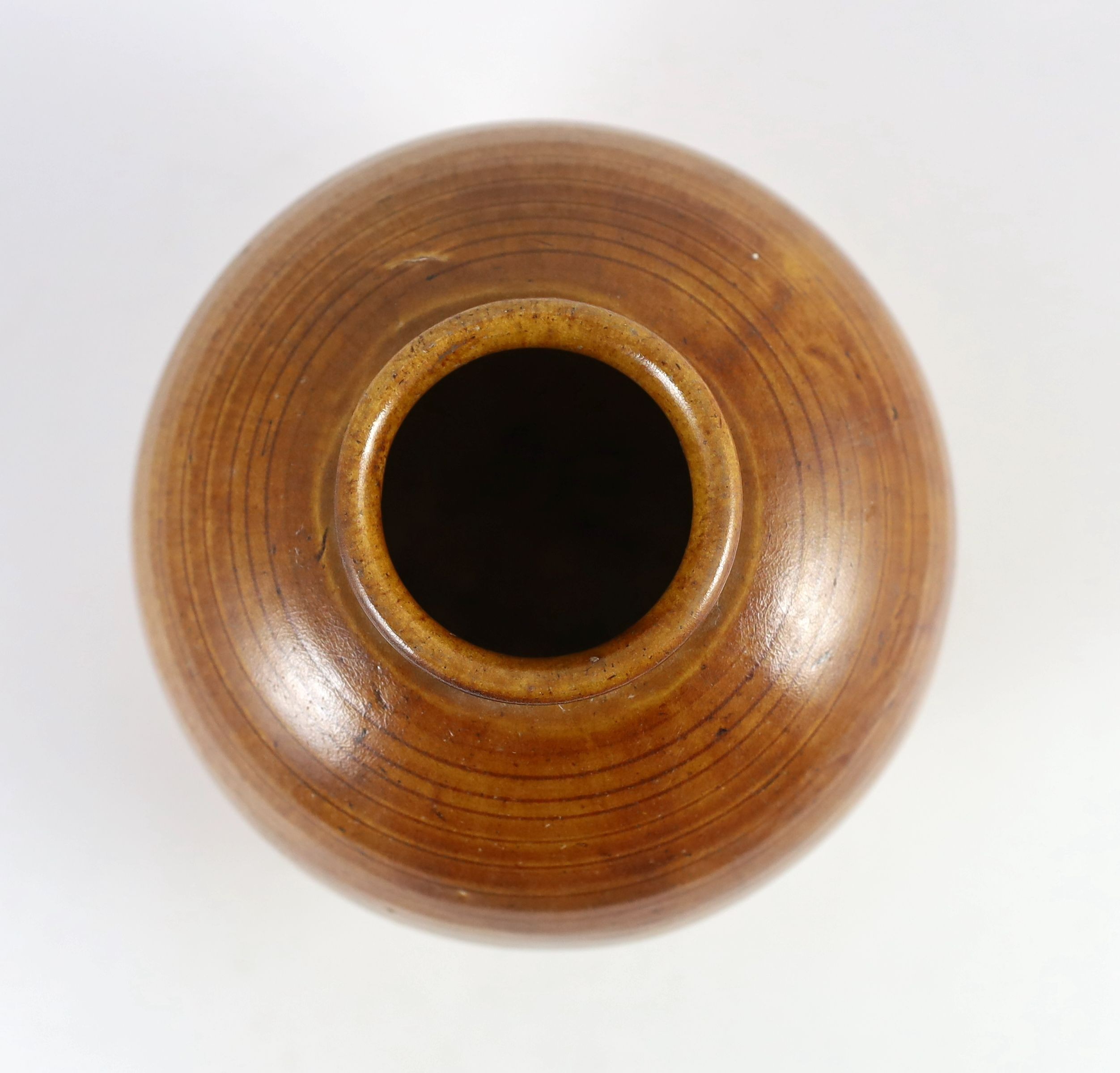 A Chinese straw glazed ovoid jar, Tang dynasty 19.5cm high